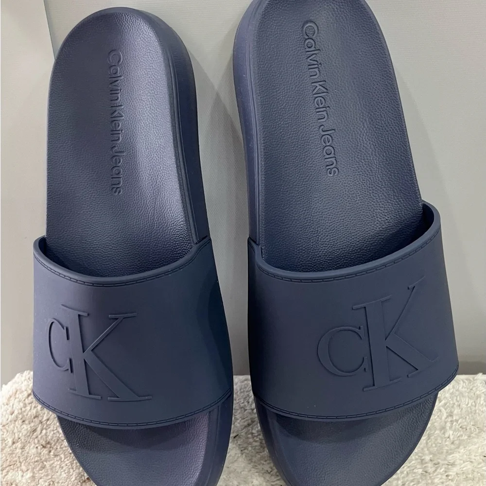 Calvin Klein Medium Gray Embossed CK‎ Slide Sandals